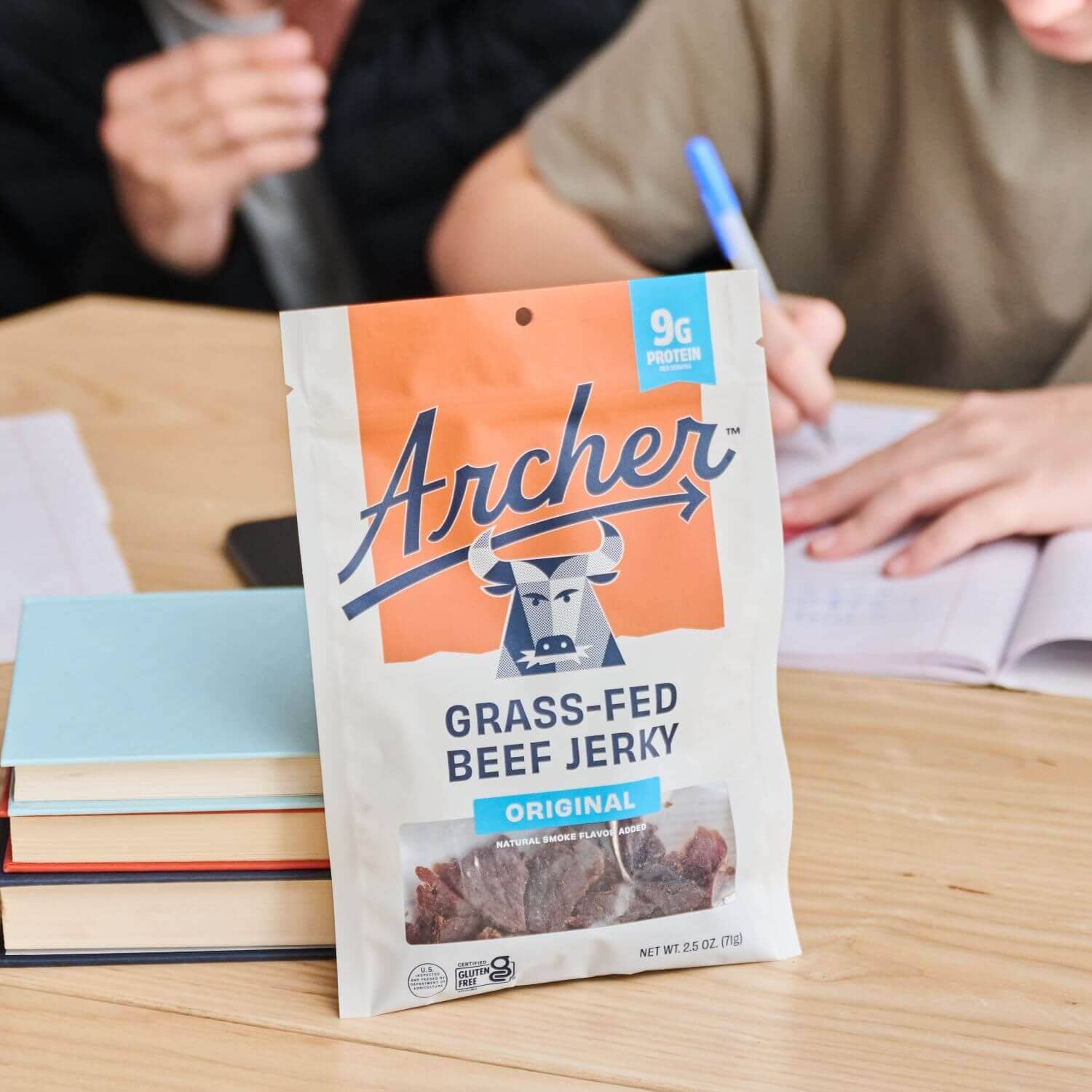 Archer Original Beef Jerky on a desk where kids are doing school work.